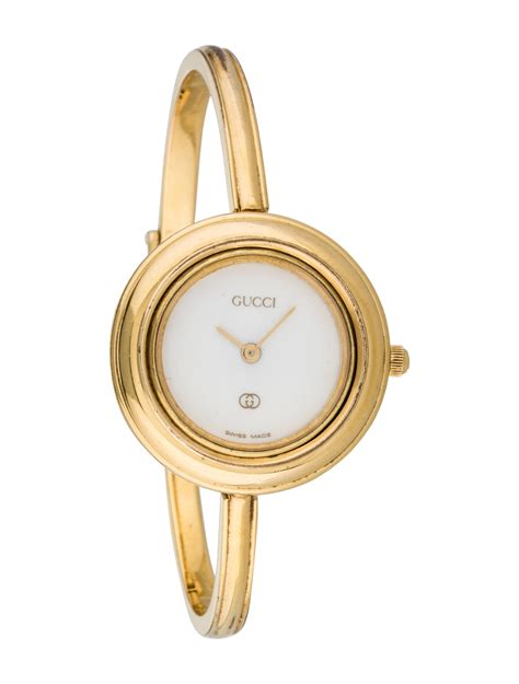 thin gold gucci watch|Gucci watch gold detailing.